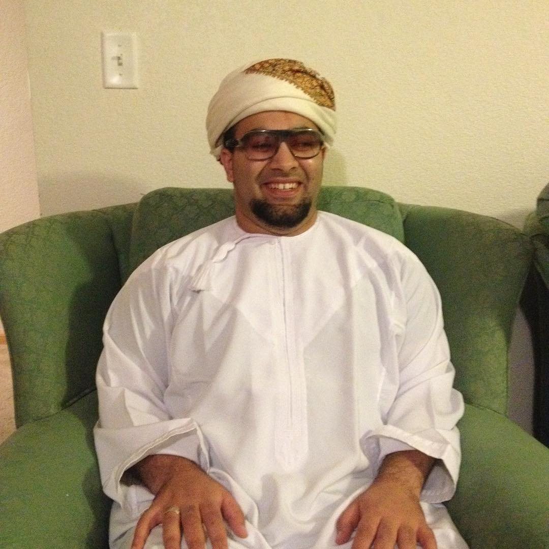 Noah wearing traditional Omani clothing